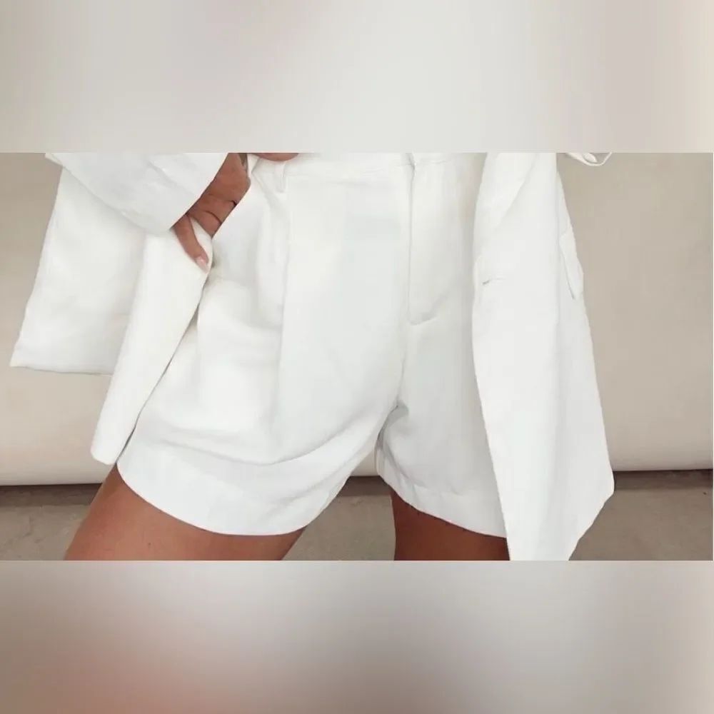 white oversized shorts